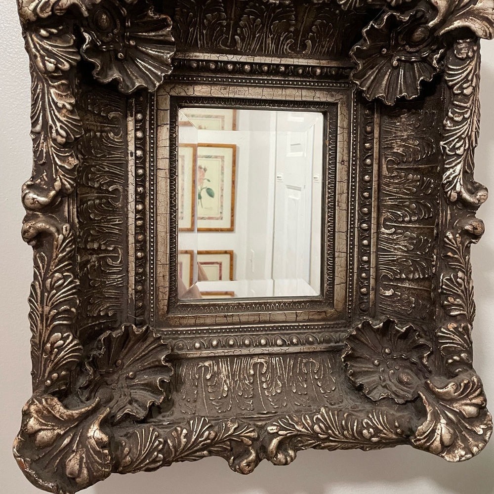 Beautiful carved mirror with little pearls in the oyster shells and much carving